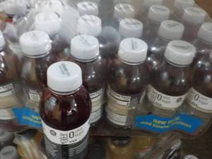 lot 387 image: Case of 24 ct 16.9 oz Bottles Vitam...