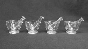 lot 31 image: Lot of 4 Mercer Glass Works 1 Ounce Mortar and Pestle Sets
