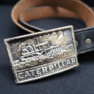 lot 40 image: VINTAGE CATERPILLAR BELT BUCKEL AND LEATHER BELT