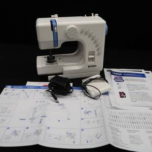 lot 51 image: KENMORE ELECTRIC SEWING MACHINE.
