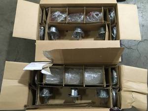 lot 21 image: Lot of 2 Home Decorators Collection Georgina 24 in. 3-light Weathered Iron Industrial indoor vanity with Clear Seeded Glass Shades  Customer Returns See Pictures