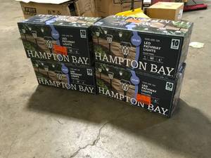 lot 22 image: Lot of Hampton Bay Dauphin Solar 6 Lumens Black Integrated LED Path Light with Textured Plastic Lens (10-Pack) WeatherRust Resistant  Customer Returns See Pictures