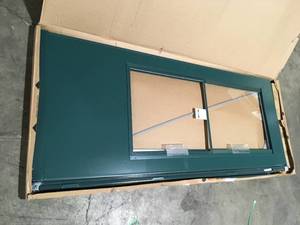 lot 40 image: Andersen 32 in. x 80 in. 400 Series Forest Green UniversalReversible Self-Storing Aluminum Storm Door with Nickel Hardware  Customer Returns See Pictures