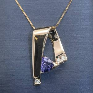 lot 19 image: Trillion Cut Tanzanite & Diamond Geometric Folded Ribbon Slide Pendant in 14k Yellow Gold $1,740 Retail