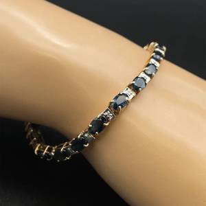 lot 25 image: 8.00 Carat Natural Oval Blue Sapphire & Diamond Tennis Bracelet in Yellow Gold $2,780 Retail