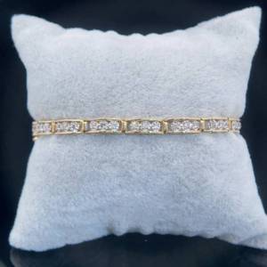 lot 15 image: 1.50 Carat Diamond Three-Stone Bar Link Tennis Bracelet in Yellow Gold $2,649 Retail