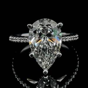 lot 1 image: Brand New 4.58 Carat Diamond Pear Solitaire & Hidden Halo French Pave Ring in 14k White Gold - IGI Certification - VS Clarity. $30,900 Retail VIDEO