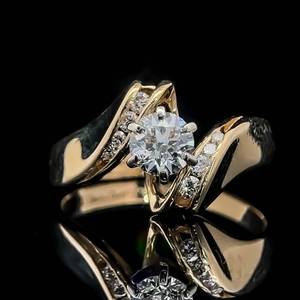 lot 33 image: 0.72 Carat Diamond Solitaire & Curved Ribbon Channel Ring in 14k Yellow Gold - VS ClarityE Color $1,860 Retail