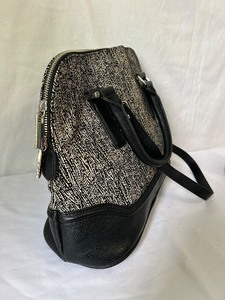 lot 54 image: Ivanka Trump Satchel with Metal Accents