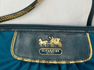 lot 192 image: Coach Wristlet
