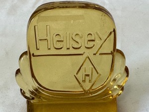 lot 88 image: Vintage 1986 Amber Glass Heisey Advertising Plaque