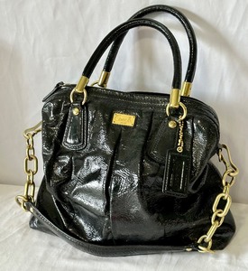 lot 229 image: Patent Leather Coach Handbag with Decorative Gold Hardware
