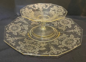 lot 211 image: (3) Pcs Yellow Glass  (2) Cambridge wApple Blossom & Gloria Etchings and (1) Depression Florentine #2 PlatterGravy Boat Holder
