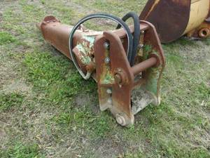 lot 6 image: Excavator Mounted Jackhammer approx. 8-feet long, Unknown what it was mounted on, and no data plate