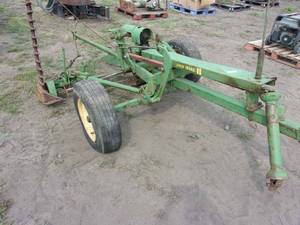 lot 10 image: John Deere No. 11 Pull-Type Sickle Mower in Working Condition, Needs Tires