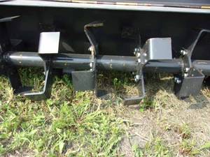 lot 28 image: New 6-foot JCT Skid Loader Mounted Tiller - Has Minor Shipping Damage