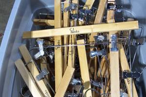 lot 2 image: Large Rubber Made Bin of CJ Banks Cloths Hangers