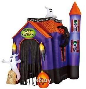 lot 29 image: Members Mark Pre-Lit 12 Tall Inflatable Haunted House Airblown Archway Tunnel