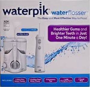 lot 57 image: Waterpik Ultra Plus and Cordless Pearl Water Flosser Combo Pack