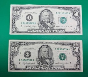 Two 1990 Fifty Dollar Bills
