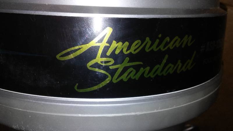 lot 620 image: Garbage Disposal. American Standard.