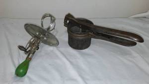 lot 550 image: Vintage A&ampJ Handheld Beater with Splash&nbspGuard and Ricer.