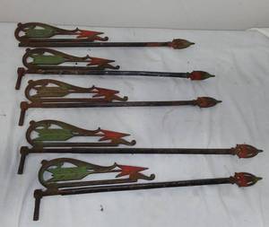 lot 555 image: Cast Metal Swing Arm Curtain Rod Arrow (5) 13 long.