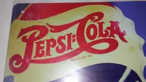 lot 701 image: Pepsi Cola Hits the Spot Metal Sign.