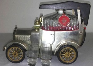 Ford Decanter and Glass set, and Music Box.