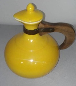 Yellow, Red Wing Server Pitcher No. 565.
