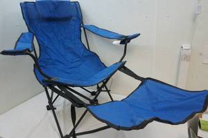 lot 282 image: Captains Chair with foot rest