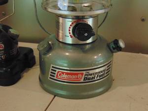 lot 78 image: Coleman Dual Fuel Lantern - Model 295Coleman Peak 1 Lantern Model - 222 with Storage Cases and Fuel