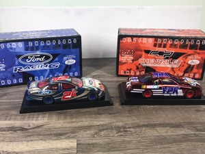 lot 14 image: 2000 Nascar Racing Champions Under the Lights 2 Car Set Ford Taurus 2K & Chevy Monte Carlo Y2K 124 scale die cast stock cars