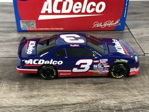 lot 46 image: 1997 Nascar Action Dale Earnhardt #3 Monte Carlo  ACDelco Suzuka Circuit November 22, 1997 Japan 124 scale die cast stock car bank