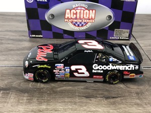 lot 50 image: 1997 Nascar Racing Action Platinum Series Collectibles Dale Earnhardt Monte Carlo #3  GM Goodwrench Plus 124 scale die cast stock car coin bank