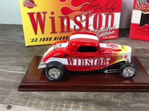 lot 55 image: 1999 NHRA Racing Champions 2 Car Set Gary Scelzi 1933 Ford High Boy & Top Fuel Dragster Winston 124 scale die cast