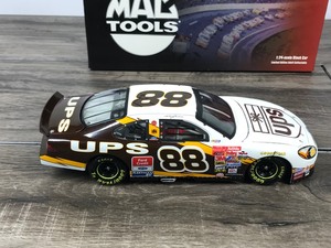 lot 59 image: 2002 Nascar Action Mac Tools Dale Jarrett Ford Taurus #88  UPS 124 scale die cast stock car