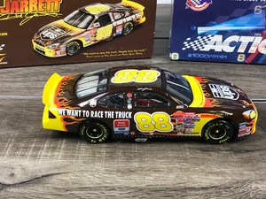 lot 60 image: 2001 Nascar Action Racing Collectible Dale Jarrett Ford Taurus #88 UPS  Race the Truck 124 scale die cast stock car