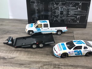 lot 71 image: 1999 Nascar Brookfield Collectors Guild 3 piece set Dale Earnhardt Jr. #31 Chevrolet Monte Carlo Race Car - Chevrolet Crew Cab - Race Car Trailer Sikkens 124 scale die cast