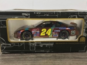 lot 73 image: 1997 Nascar Brookfield Collectors Guild Jeff Gordon Monte Carlo #24 DuPont  Chromalusion 124 scale die cast stock car