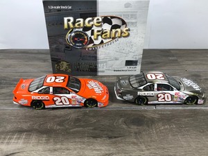 lot 74 image: 2000 Nascar Brookfield Collectors Guild Race Fan Collectibles 2 Car Brushed Metal Stock Car set Tony Stewart Grand Prix #20 Home Depot  Rookie of the Year 124 scale die cast