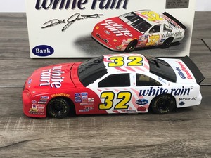 lot 78 image: 1997 Nascar Action Dale Jarrett Thunderbird #32  White Rain 124 scale die cast stock car coin bank