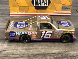 lot 82 image: 1997 Action Ron Hornaday Chevy Race Truck #16  Napa Gold 124 scale die cast