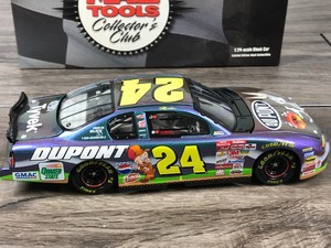 lot 96 image: 2001 Nascar Mac Tools Collectors Club Jeff Gordon Monte Carlo #24 DuPont  Looney Tunes 124 scale die cast stock car
