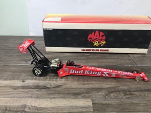 lot 101 image: 1995 NHRA Mac Tools Racing Kenny Bernstein Budweiser 124 scale die cast top fuel dragster