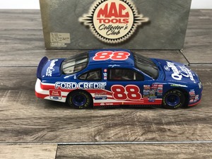 lot 103 image: 1999 Nascar Mac Tools Collectors Club Dale Jarrett Ford Taurus #88  Quality Care 124 scale die cast stock car