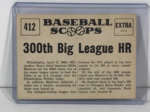lot 119 image: 1961 Baseball Scoops Eddie Mathews Blasts 300th Big League Home Run Baseball Card #412