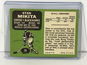 lot 166 image: 1970 - 1971 Topps Stan Mikita Chicago Black Hawks #20 Hockey Card