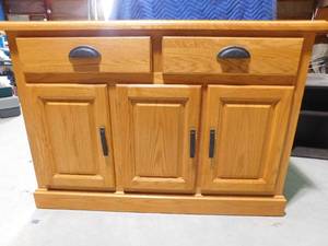lot 1 image: Solid wood cabinet by Winners Only Inc.