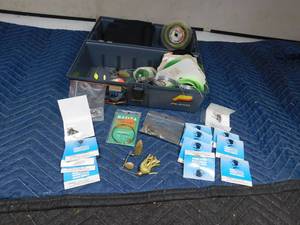 lot 246 image: Plano tackle box of fish line, hooks and more